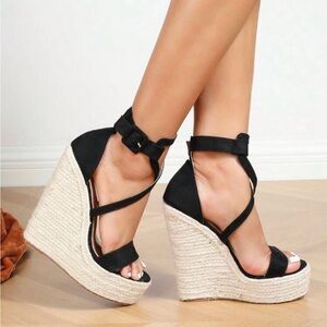 Black wedges, size 8. Brand new.